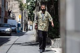 درگیری هومن حاجی عبداللهی با یک زن در خیابان +عکس