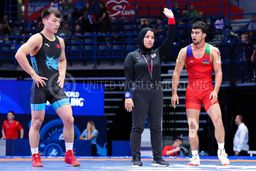 قضاوت داور محجبه در رقابت های کشتی جهان! + عکس