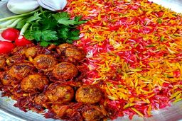 طرز تهیه یک پلوی خوشمزه و آسان برای شب یلدا | مهمانان‌تان را با این غذای خوش آب و رنگ غافلگیر کنید